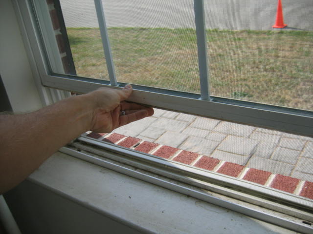 Testing the windows during a home inspection